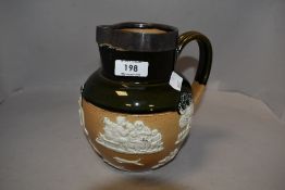 A Royal Doulton stoneware hunting jug with applied silver rim and two-tone globular body moulded