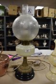 A Victorian brass and glass oil lamp, later converted