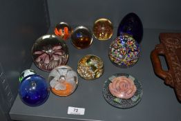 A limited edition Caithness lamp-work 'Glass Rose' paperweight, 59/100, sold along with a