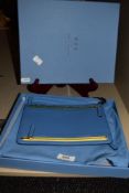 A Smythson of Bond Street multi-zip leather currency holder, in Panama blue with material lining,