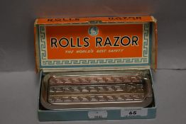 A vintage Rolls Razor, The World's Best Safely Razor, sold with original card outer packaging