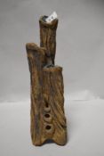 A mid century Clive Brooker studio pottery vase in naturalistic form aprox 35cm