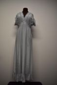 A powder blue Art Deco nightdress having cross over bust with pink embroidered floral design and