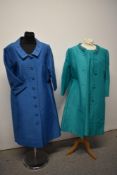 An early 1970s two piece dress suit in emerald green and a blue Peggy French Couture coat, medium to