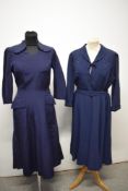 Two navy blue dresses one late 1940s with belt, side metal zip and diamante and quilted floral
