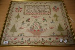 A framed and glazed Georgian needlework sampler of large proportions, having verse, animals and