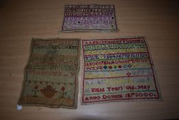 Three Georgian and Victorian needlework samplers, to include Amelia Gregory 1823, Louisa Hicks, aged