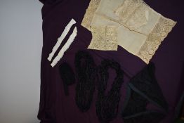 A collection of antique lace and edging in black, two collars and three modesty panels.