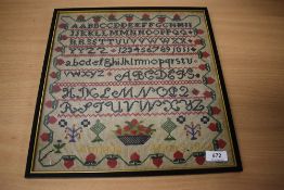 A Victorian needlework sampler, using a range of numbers, alphabet and floral depictions, Amelia