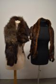 A vintage mink tippet and a silver fox stole.