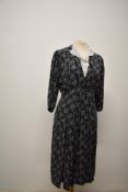 A semi sheer 1930s/1940s day dress of floaty floral fabric, possibly silk blend, with self covered