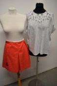 A 1960s red St Michaels mini skirt with anchor detail and a white blouse of similar age.