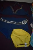 A collection of ladies vintage 1960s and 70s swimwear and accessories including swimming caps,