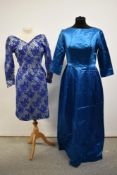 A 1960s teal blue satin maxi dress and a late 1950s satin with lace overlay dress in pale blue and