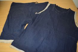 An early 20th century gents two piece swim suit in blue and white.