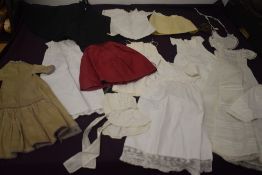 A scarce collection of antique Victorian and Edwardian dolls clothing, exceptional detailing to some