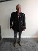 A WW2 Naval Commanders Jacket having eight brass Naval buttons three woven rings on cuffs, 39-45