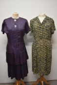 A late 1950s blue silk dress with red motif pattern having tiered and pleated skirt with large