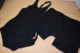 A 1930s gents Jantzen black wool swim suit and a pair of trunks.