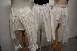 Three pairs of Victorian split leg bloomers.