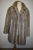 A vintage silver mink coat having Koe-Bel furs, 419 Lord St, Southport label.