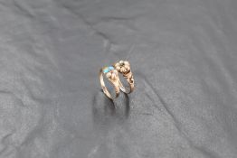 Two antique cluster rings having seed pearl and turquoise decoration with ruby and tourmaline