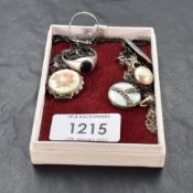A selection of silver jewellery including a locket, cushion pearl necklace, a signet ring and