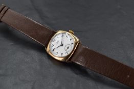A gent's vintage 9ct gold wrist watch by Tavannes having Arabic numeral dial with subsidiary seconds