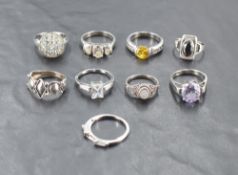 A group of nine 925 grade white metal dress rings, various designs, 33.8grams gross weight.
