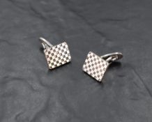 A pair of Georg Jensen silver cufflinks model: 113, having checker board patterned panels