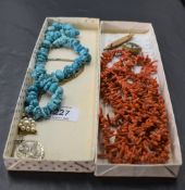 A small selection of jewellery including a long string of branch coral, mosaic brooches, silver St