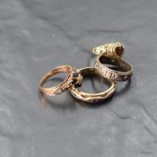 A 9ct gold diamond chip and sapphire cluster ring, of flower head form centred by a small diamond