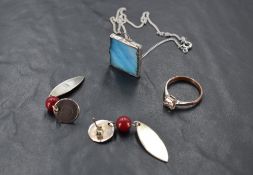 A small group of white metal jewellery, comprising two pendants and chains, drop earrings and