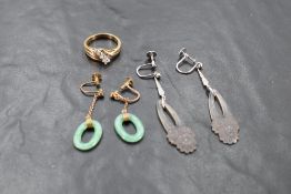 Two pairs of vintage screw back drop earrings, in white and yellow metal, both stamped 9ct, having