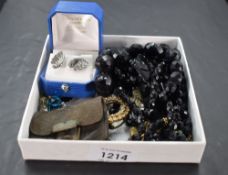 A small selection of costume jewellery including Mourning jewellery silver maple leaf brooch,