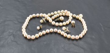 A string of cultured pearls of even form having 9ct gold clasp, approx 18' and 3 pairs of cultured
