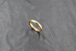 An 18ct gold wedding band, ring size I-M, 4.1grams,