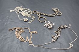 A small selection of silver and white metal jewellery including marcasite necklace, butter fly