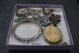 A selection of silver and white metal jewellery including enamelled bangle, marcasite ring and
