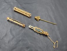 Three yellow metal/9ct gold bar brooches and a stick pin, of various forms, approx 10.5g