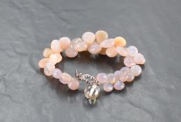 A multi stone polished pebble agate bracelet with crystal bead and loop clasp