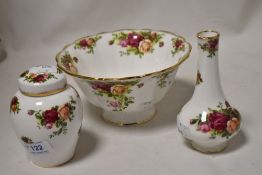 A trio of Royal Albert Old Country Roses, to Include bud vase, ginger jar and footed bowl.