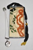 A vintage black jet effect brooch bearing the name Alice, an orange gem stone beaded necklace and