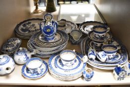 A large collection of Blue and White wares including Willow pattern, Chinese teapots, Delft ware
