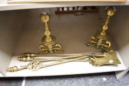 A vintage brass fire side companion set.