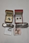 A small selection of silver and white metal jewellery including two pairs of stud earrings, a band