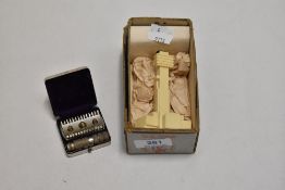 A boxed miniature study of the Tower Of Empire, Scotland Empire Exhibition 1938, and a compact