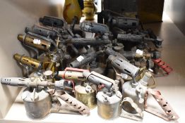A large collection of vintage brass blow torches etc including Primus