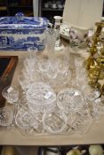 A selection of modern clear cut crystal glass wares including port glasses, tray, vases and a pair