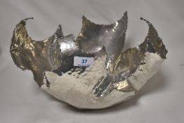 A Crister Wide art metal fruit bowl of naturalistic form, marked underside with C.Wide Kolmarden,